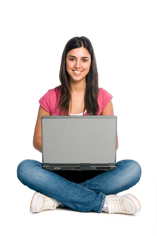 Happy smiling latin girl working on laptop isolated on white background. Happy smiling latin girl working on laptop isolated on white background
