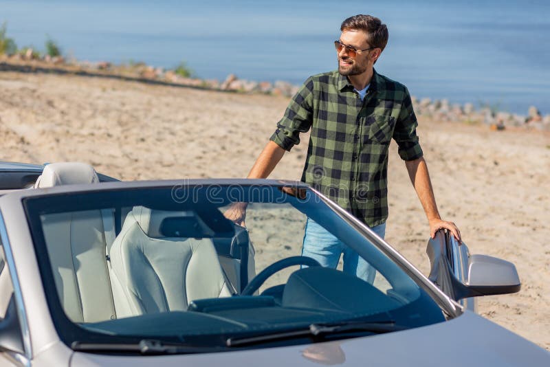 Smiling Guy Open Door of Convertible To Sit in Stock Image Image of