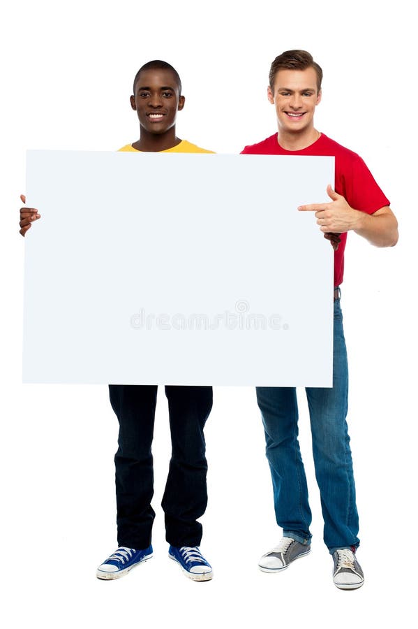 Smiling guys with white ad board stock photo Smiling guys with white ad board stock photo
