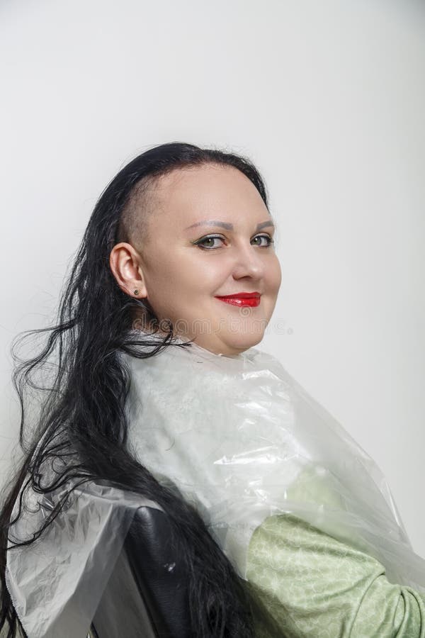 Smiling With Half Shaved Head Brunette Woman With Bright Makeup In Barber Chair Stock Image