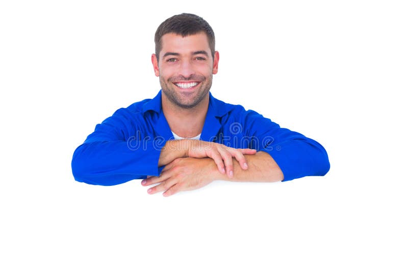 Portrait of smiling handyman with blank billboard on white background. Cut smiling stock images, royalty-free photos and pictures