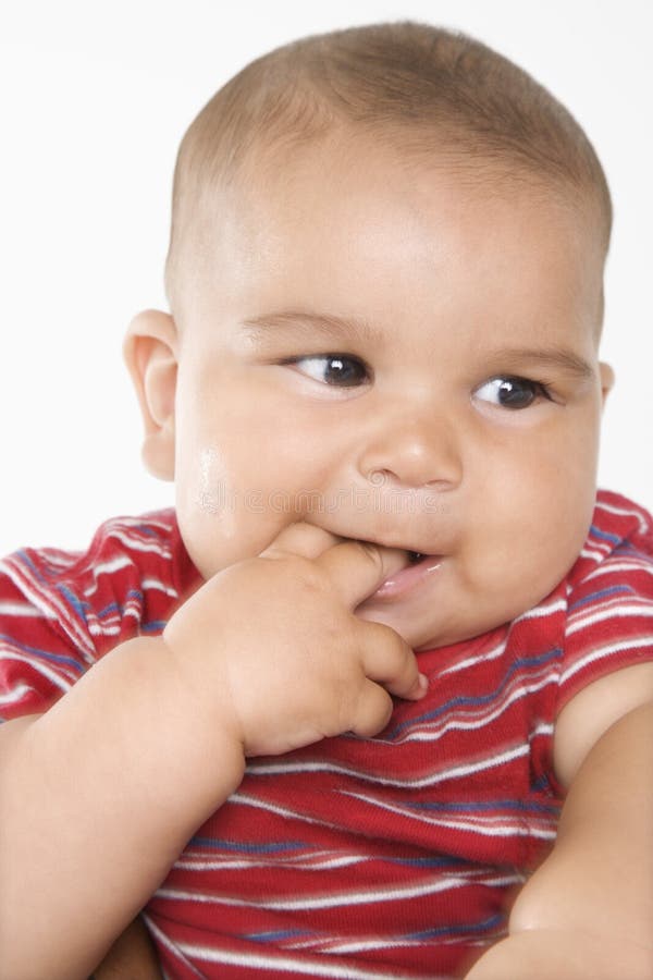 Smiling hispanic male baby. stock image