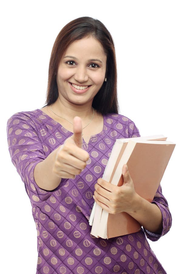 Smiling Indian female student against white