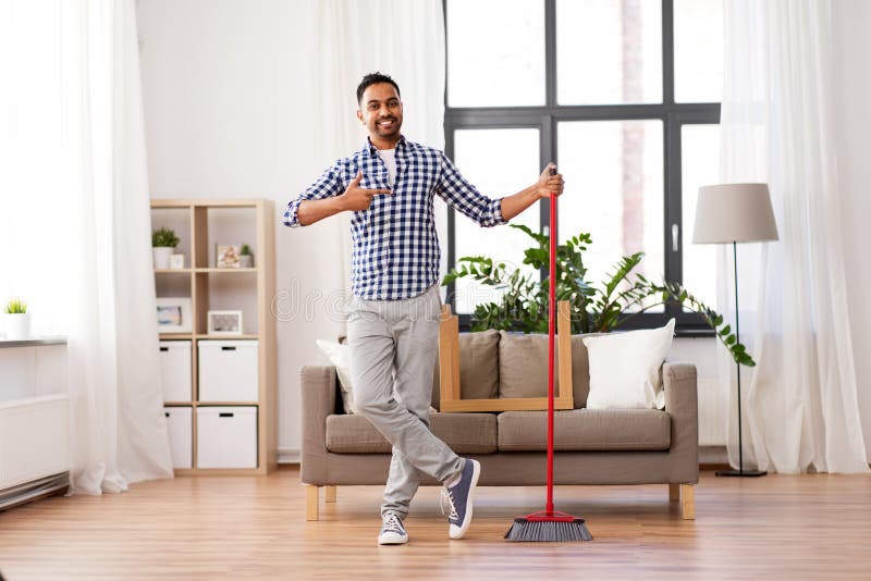 Man with Broom Cleaning and Having Fun at Home Stock Image - Image of ...