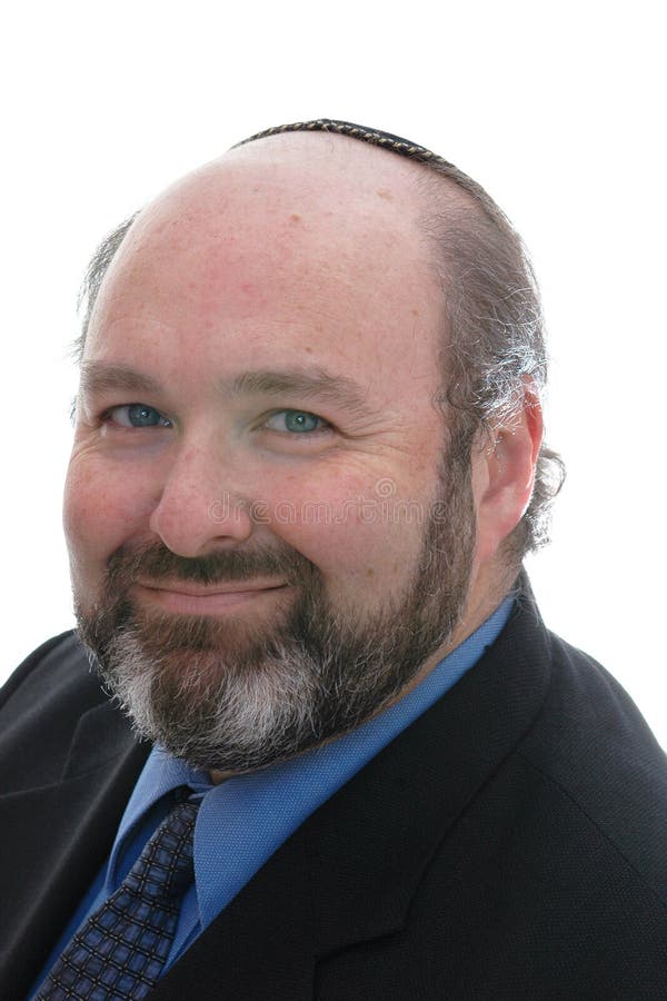 Smiling jewish man in skullcap royalty free stock image