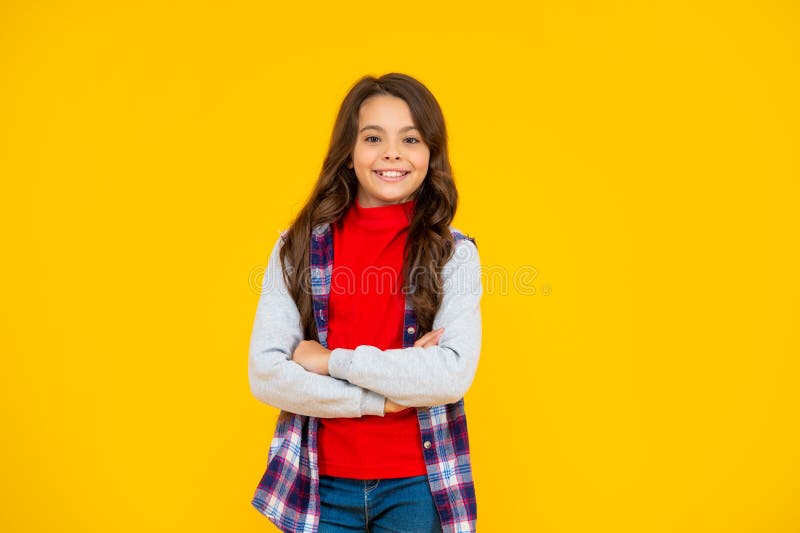 Smiling Kid in Casual Clothes on Yellow Background. Happy Childhood ...