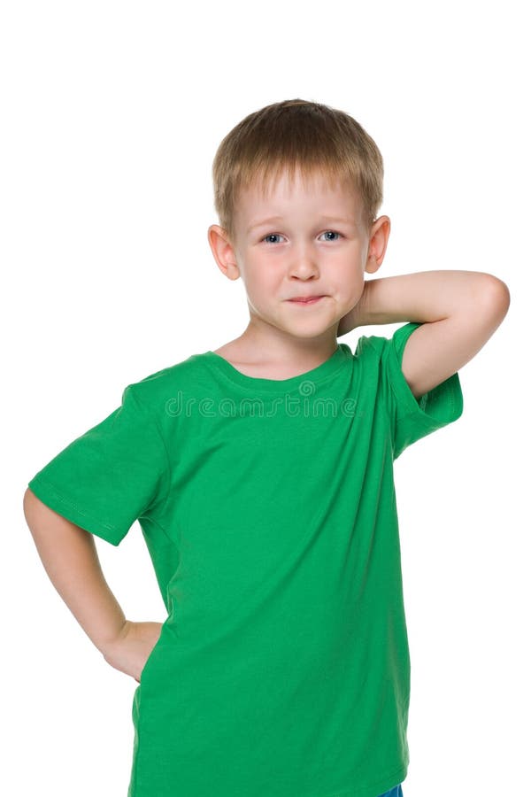 Little Boy in a Green Striped Shirt Looks Forward Stock Photo Image