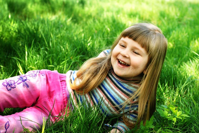 Smiling Little Girl on grass