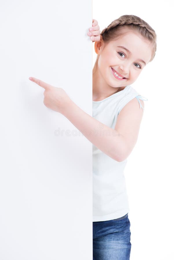 Smiling little girl holding empty white banner.