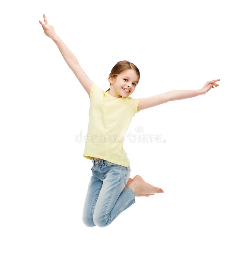 Smiling little girl jumping stock images Smiling little girl jumping stock images