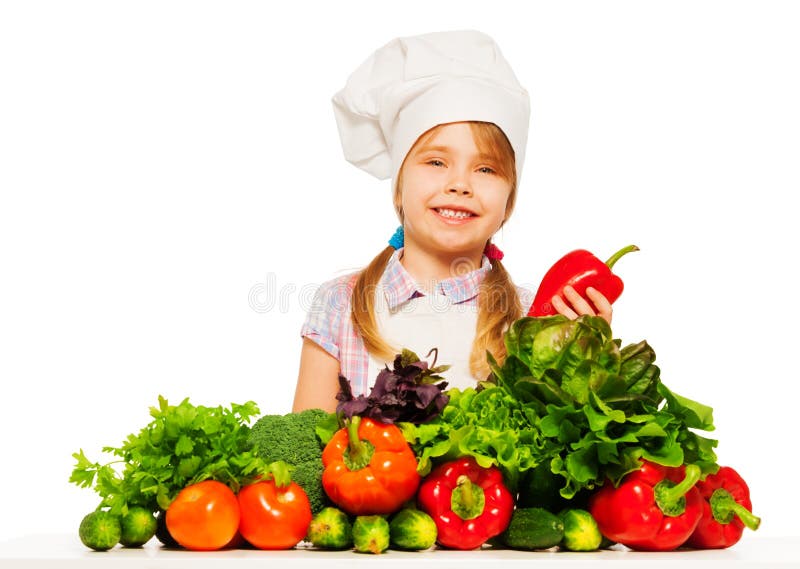 Smiling little girl preparing healthy food