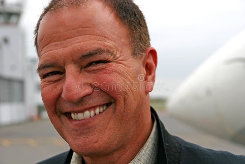 Smiling Man at Airport