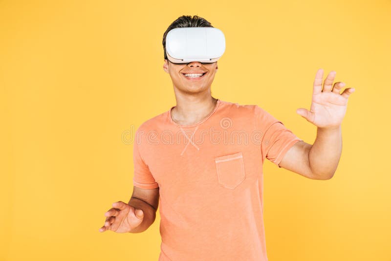 Smiling man gesturing while using virtual royalty free stock photo
