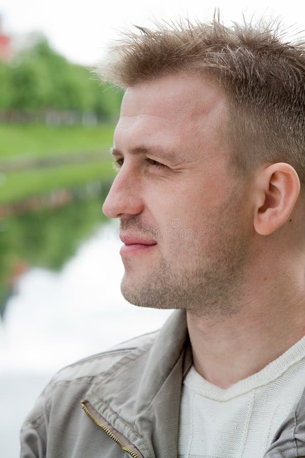 Smiling man half face stock photo. Image of smiling, portrait 5213730