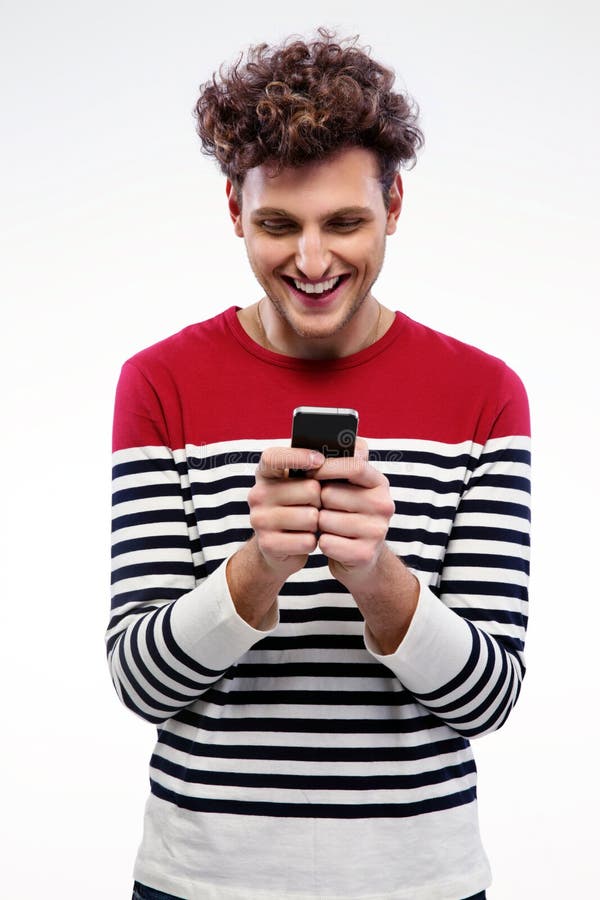 Smiling man using smartphone over gray background. Cut smiling stock images, royalty-free photos and pictures