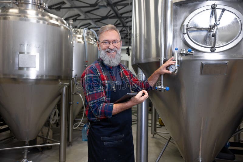 Smiling Mature Brewery Worker at His Working Place Stock Image Image