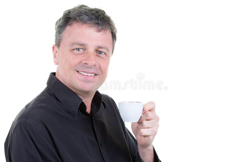 Smiling middle aged blue eyes man holding coffee cup stock photo