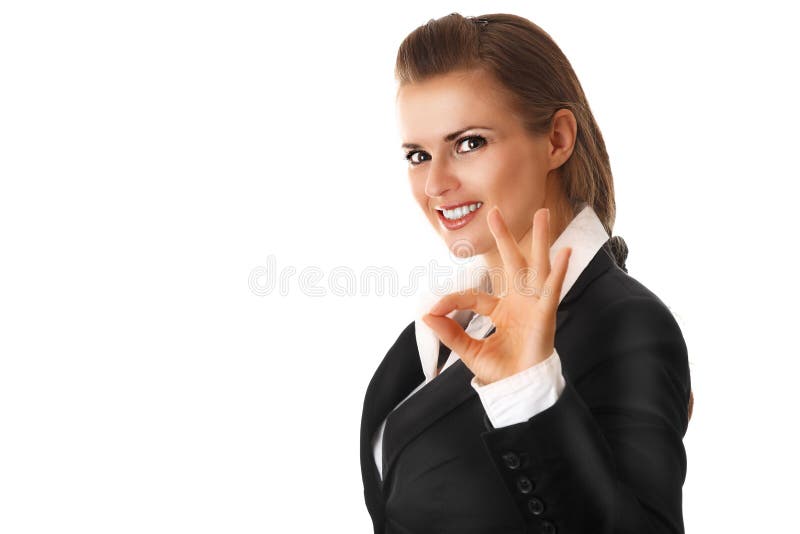 Smiling modern business woman showing ok gesture