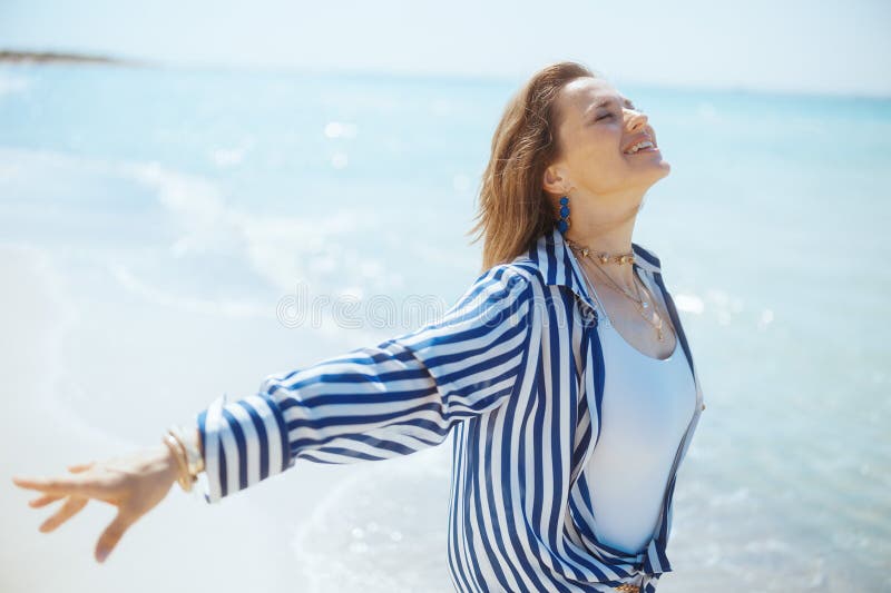 Smiling Modern Female on Beach Rejoicing Stock Photo Image of smile