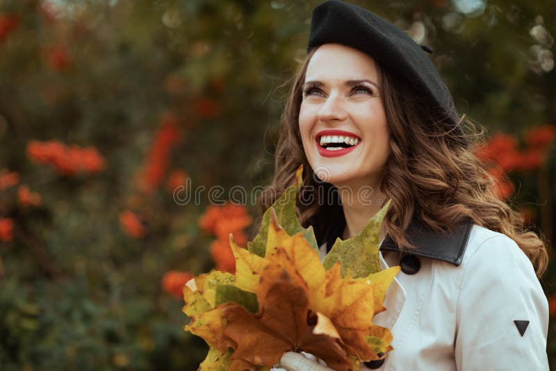 Smiling Modern Female in Beige Trench Coat Stock Image - Image of ...