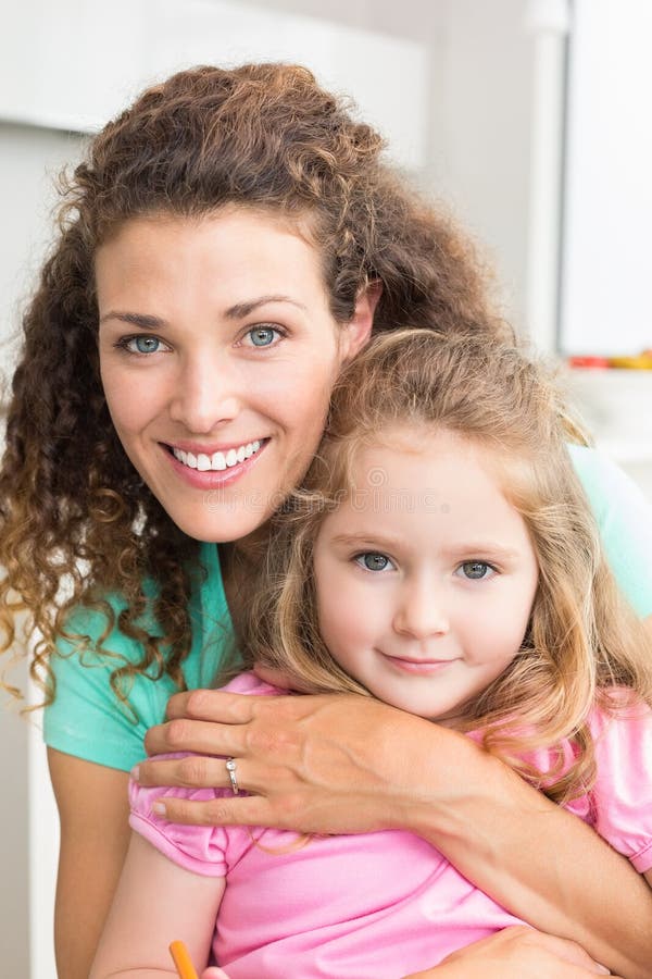 Smiling Mother And Daughter Cuddling Stock Image Image Of Looking 