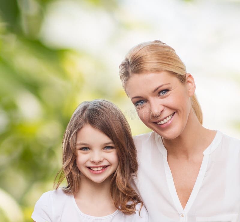 Smiling Mother and Little Girl Stock Photo - Image of natural, nature