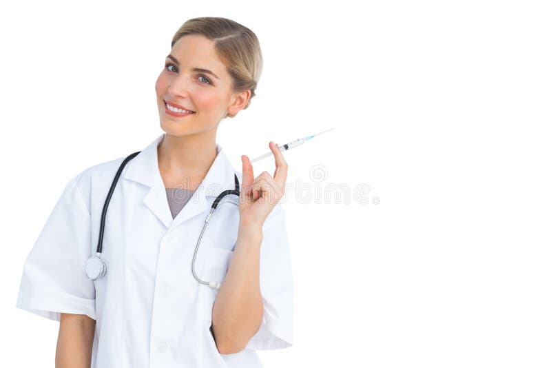 Smiling nurse preparing syringe