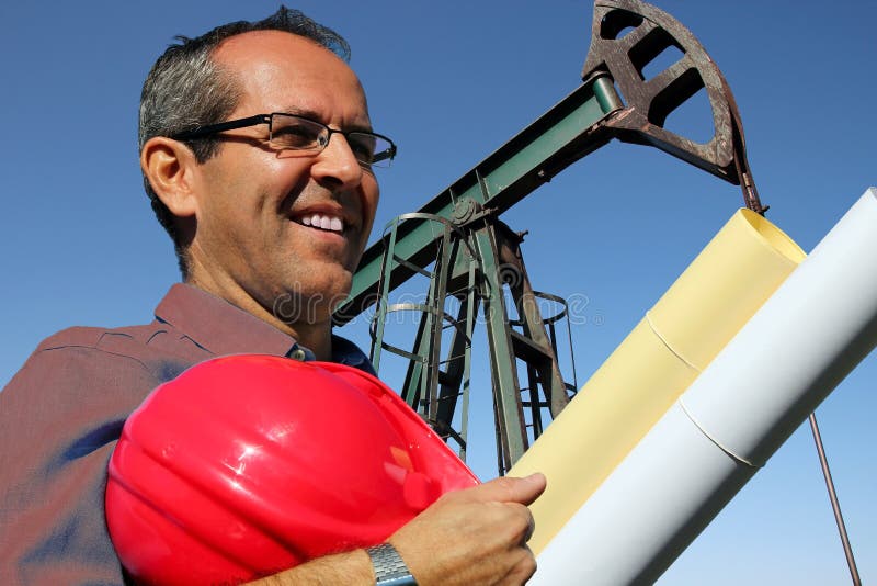 Petroleum Engineer Controlling Work of Oil Well Pump Jack. Stock Image