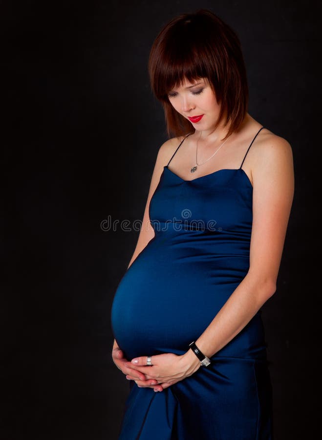 A smiling pregnant woman