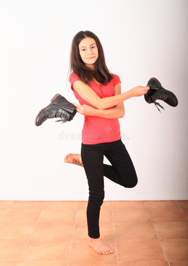 Smiling Girl Posing with Black Shoes in Hand Stock Photo - Image of bare,  hold: 172783464