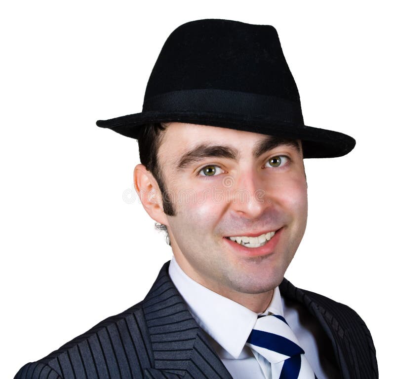 Smiling retro businessman in hat