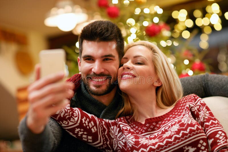 Romantic Couple Taking Selfie Picture with Smartphone at Home Stock ...