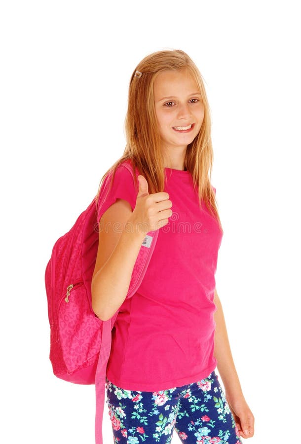 Smiling schoolgirl with her thumps up.