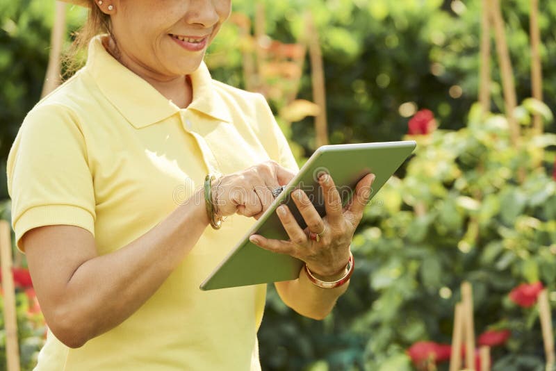 Smiling Gardener With Tablt Computer Stock Photo Image Of Aged