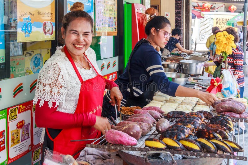 Smiling street food vendor editorial stock photo. Image of sweet