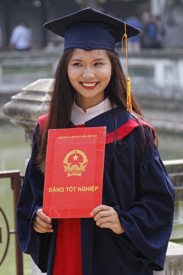 Smiling student with her diploma