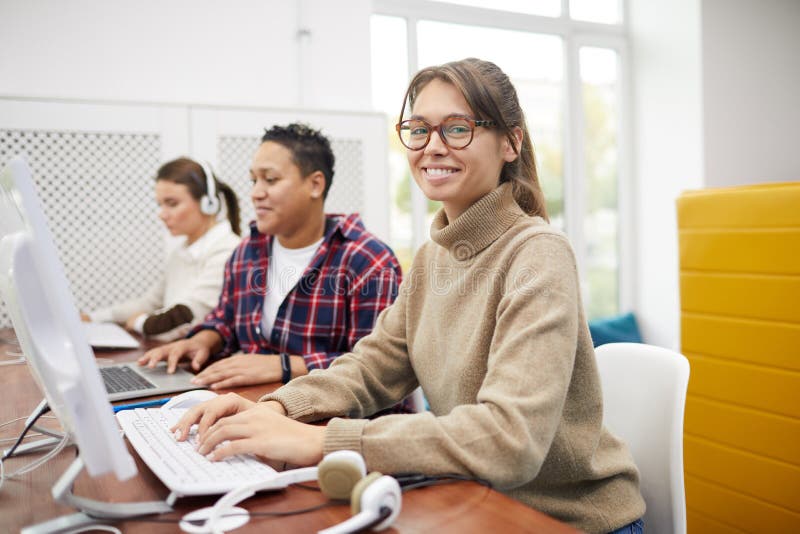Smiling Students in Computer Class royalty free stock photography