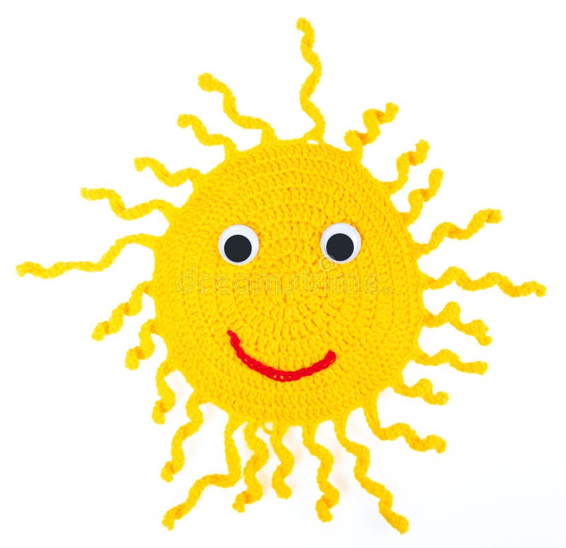 Smiling sun with spiral rays. Over white. Smiling knitting sun with spiral rays. Woolen. Homemade. Over white royalty free stock photos Smiling sun with spiral rays. Over white. Smiling knitting sun with spiral rays. Woolen. Homemade. Over white royalty free stock photos