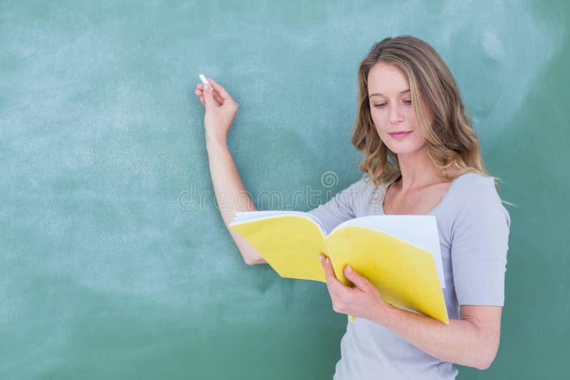 Smiling Teacher Writing On Blackboard Stock Image Image Of Blackboard Woman 51652573