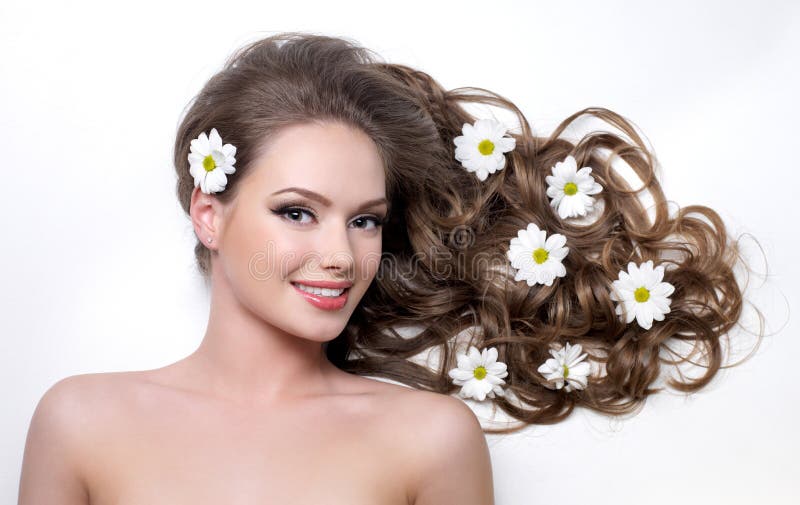 Smiling teen girl with flower in hair stock photos Smiling teen girl with flower in hair stock photos