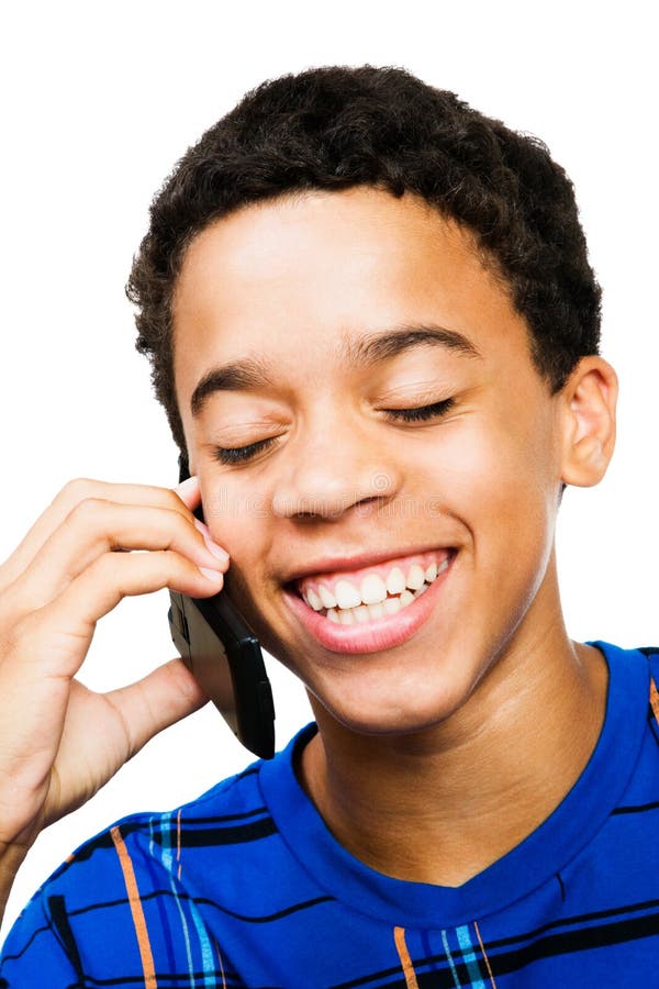 Smiling Teenage Boy Using Phone stock photo Smiling Teenage Boy Using Phone stock photo