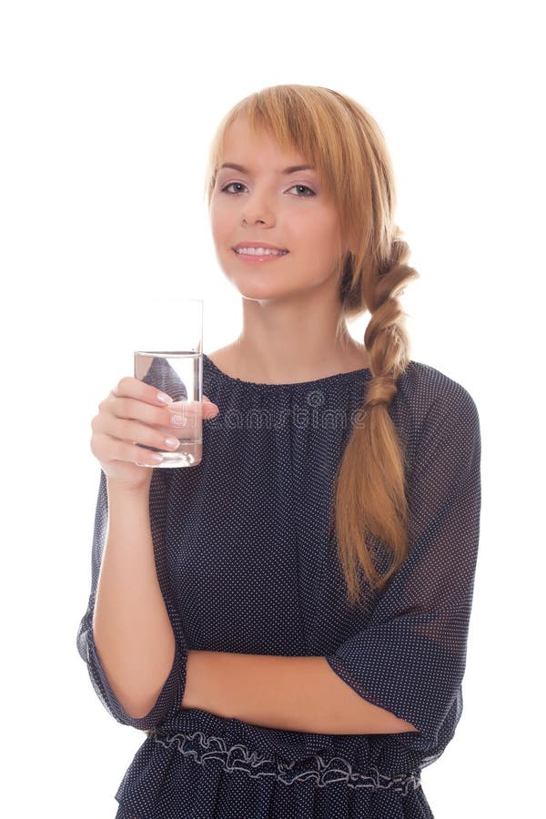 Smiling teenager holding glass cold water royalty free stock photo
