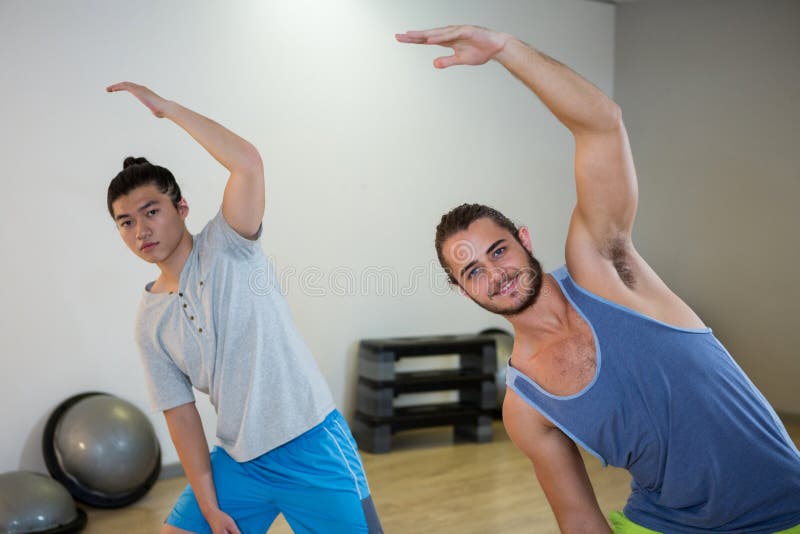 Smiling Two Men Doing Aerobic Exercise Stock Photo Image of people