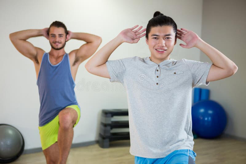 Smiling Two Men Doing Aerobic Exercise Stock Photo Image of people