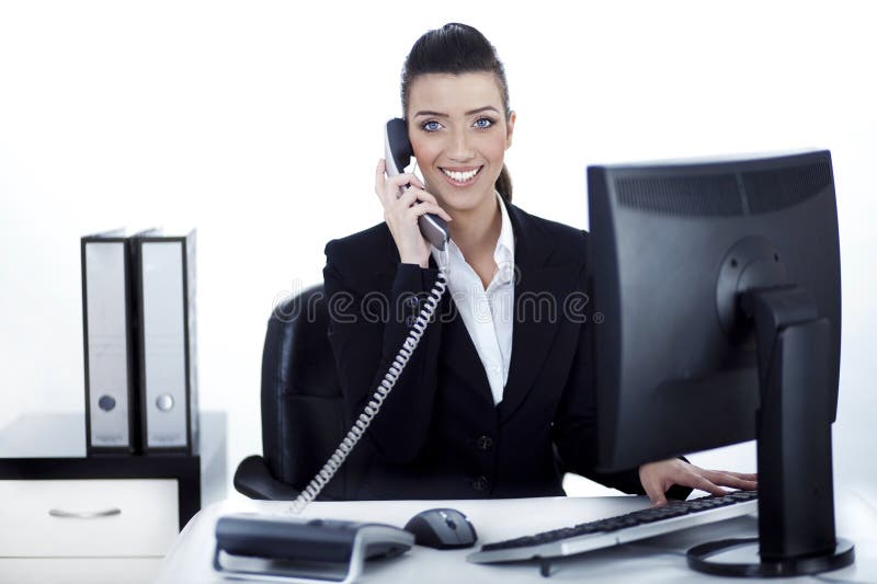 Smiling woman busy over phone