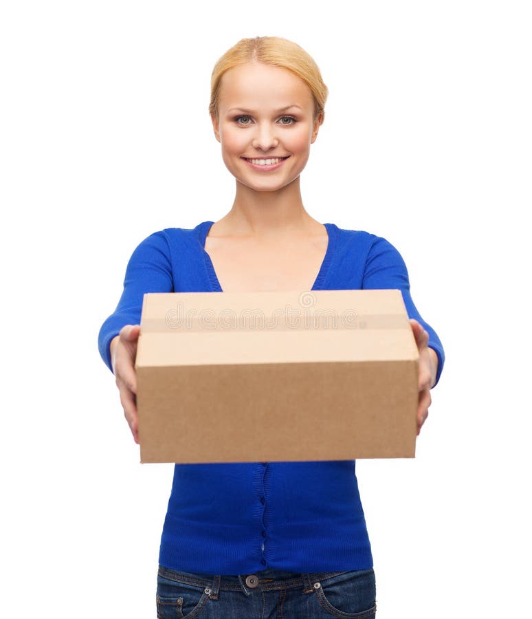 Smiling woman in casual clothes with parcel box royalty free stock photos