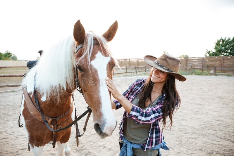 Cowgirl Sitting On Horse High Resolution Stock Photography 