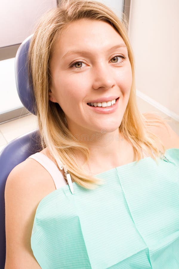 Smiling woman at dentistry