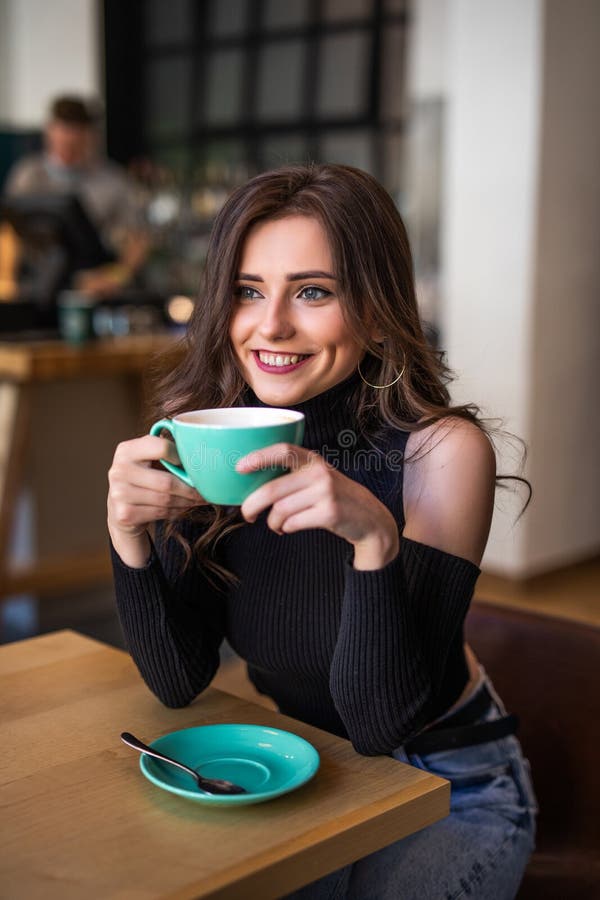 Smiling Woman In A Good Mood With Cup Of Coffee Sitting In Cafe Stock Image Image Of Woman