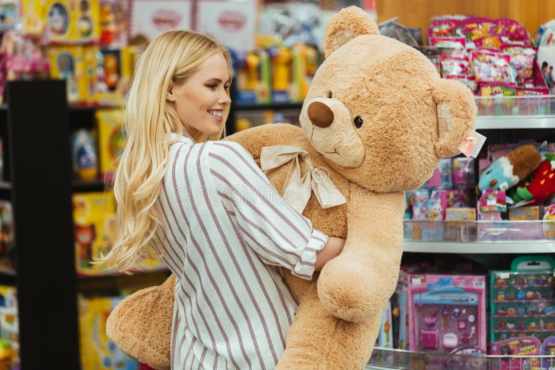 Woman Buying Teddy Bear Stock Photos - Free & Royalty-Free Stock